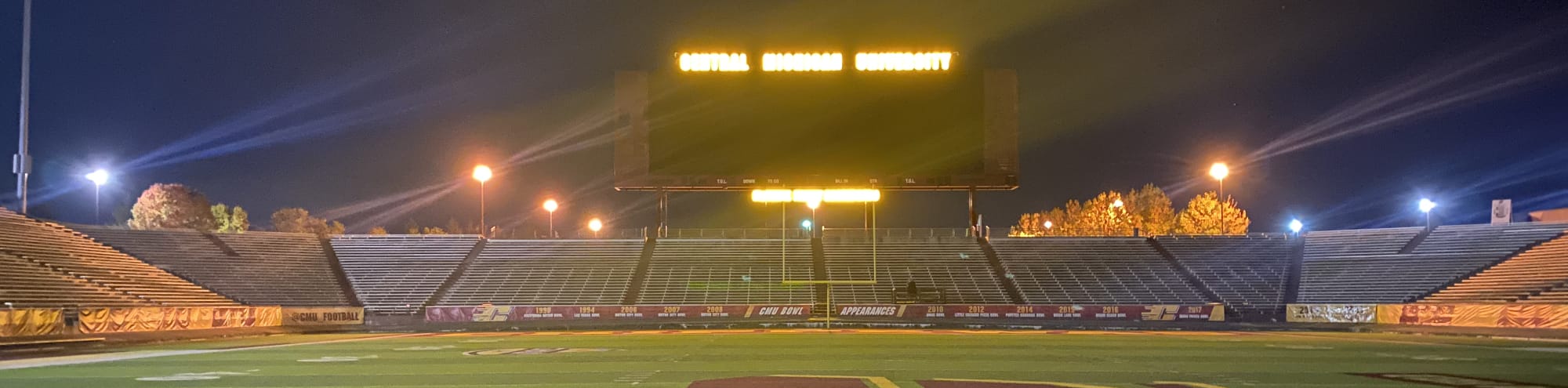empty football stadium at night under the lights Austin