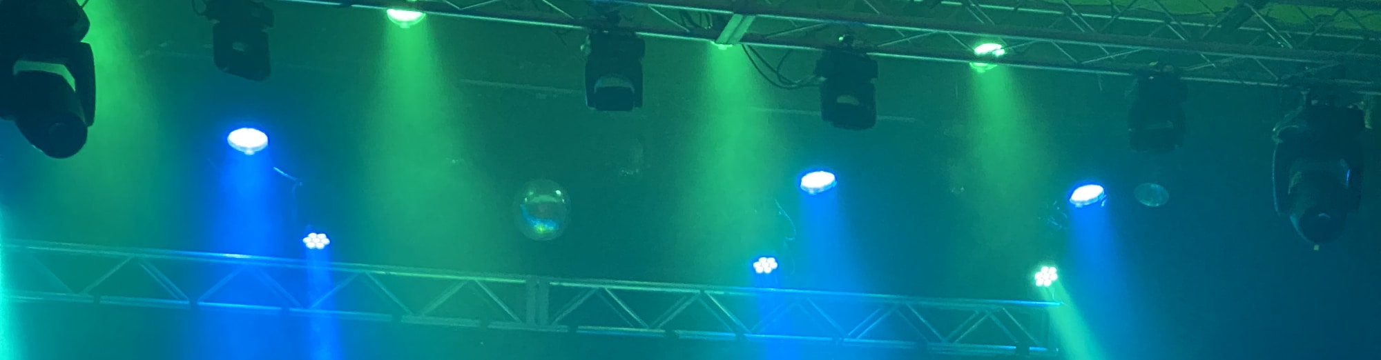 blue and green theater stage lights Austin