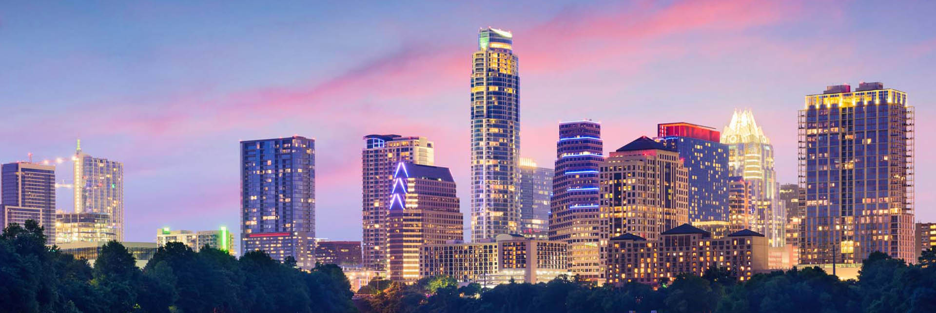 Neon color image of a band playing and people singing along