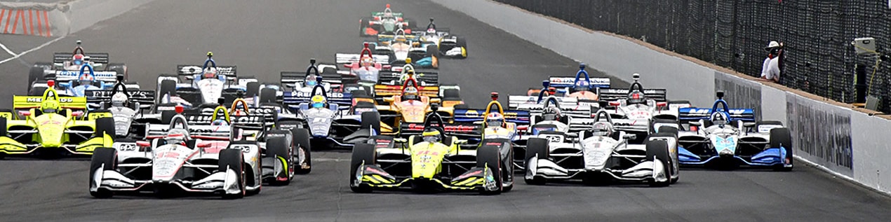 indy cars racing to through the start line Austin